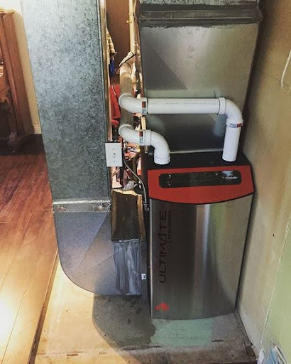 A furnace installed by John Sadler Plumbing & Heating.